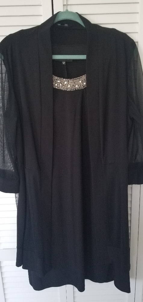 Black dress with jacket and jewelled neckline